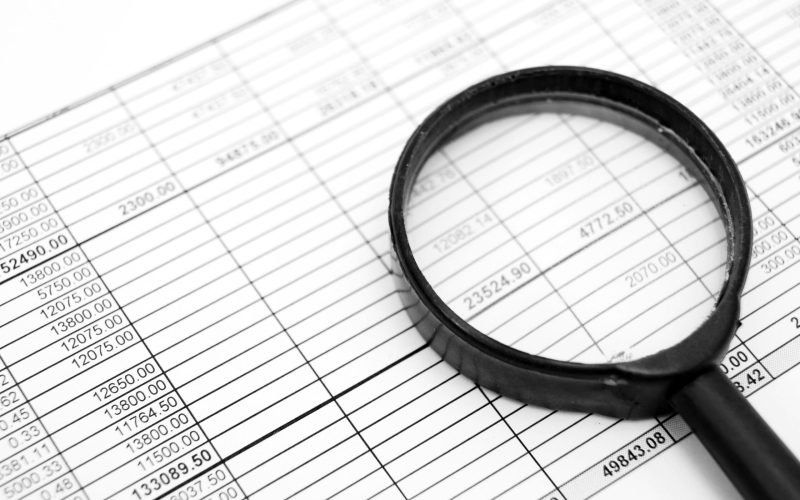 magnifiers-and-documents-accounts-department-2025-10-13-14-10-48-utc